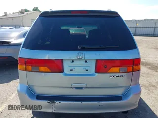 2003 Honda Odyssey EX-L with VIN 5FNRL18973B148675, listed as a IAAI auction lot 41992952 with 232,013 mi miles and . Bid and sale history available at DreamBid. Image 16.