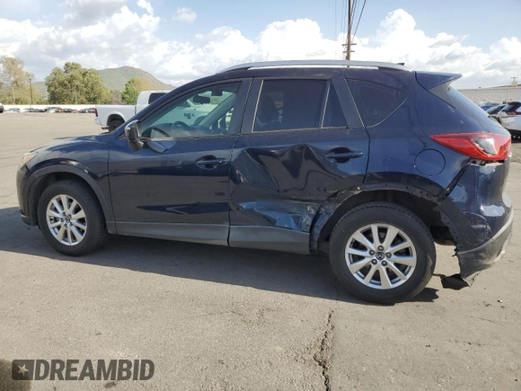 2016 Mazda CX-5 Sport with VIN JM3KE2BY0G0730906, listed as a Copart auction lot 51611865 with 207,166 mi miles and Salvage Title. Bid and sale history available at carsss.com. Image 2.
