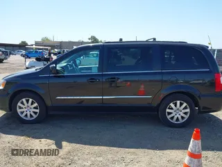 2016 Chrysler Town & Country Touring with VIN 2C4RC1BG5GR230356, listed as a IAAI auction lot 41993002 with 153,821 mi miles. Bid and sale history available at carsss.com. Image 14.