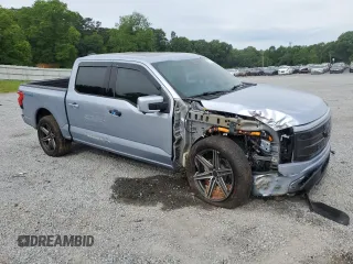 2022 Ford F-150 Lightning Pro with VIN 1FT6W1EV4NWG01810, listed as a Copart auction lot 55172465 with 46,112 mi miles and Salvage title. Bid and sale history available at DreamBid. Image 4.
