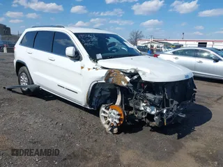 2018 Jeep Grand Cherokee Altitude with VIN 1C4RJFAG5JC285040, listed as a IAAI auction lot 41883803 with 105,926 mi miles and . Bid and sale history available at DreamBid. Image 1.