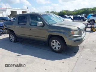 2007 Honda Ridgeline RTL w/Leather with VIN 2HJYK16527H547522, listed as a IAAI auction lot 41939603 with 127,899 mi miles. Bid and sale history available at carsss.com. Image 1.
