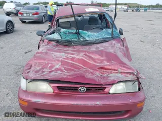 1997 Toyota Corolla with VIN 1NXBA02E6VZ546330, listed as a IAAI auction lot 41814505 with 206,504 mi miles. Bid and sale history available at carsss.com. Image 6.
