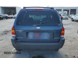 2001 Ford Escape XLS with VIN 1FMYU01BX1KB53168, listed as a Copart auction lot 76547834 with 71,025 mi miles and Salvage title. Bid and sale history available at DreamBid. Image 6.
