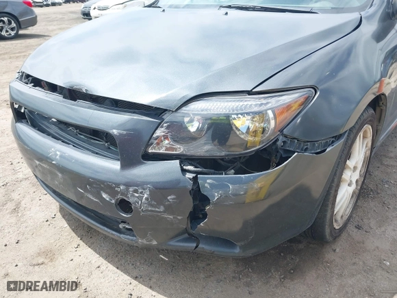 2006 Scion tC with VIN JTKDE177260081483, listed as a IAAI auction lot 42076072 with 156,556 mi miles. Bid and sale history available at carsss.com. Image 21.