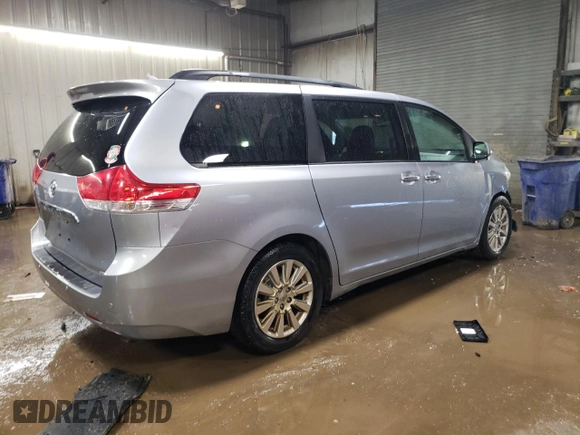 2011 Toyota Sienna XLE AAS with VIN 5TDYK3DC0BS174864, listed as a Copart auction lot 50387005 with 218,938 mi miles and Salvage Title. Bid and sale history available at DreamBid. Image 3.