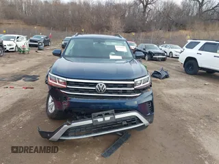 2023 Volkswagen Atlas SE z VIN 1V2KR2CA8PC504298, wystawiony jako IAAI lot #41234957 z przebiegiem 34 762 mil mil oraz . Historia ofert i sprzedaży dostępna na DreamBid. Obrazek 12.