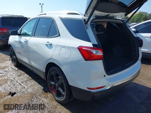 2021 Chevrolet Equinox Premier z VIN 2GNAXNEV9M6120241, wystawiony jako IAAI lot #42222928 z przebiegiem 104 274 mil mil oraz . Historia ofert i sprzedaży dostępna na DreamBid. Obrazek 3.