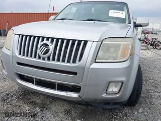 2009 Mercury Mariner Premier with VIN 4M2CU87G59KJ25154, listed as a IAAI auction lot 42050544 with 210,905 mi miles. Bid and sale history available at carsss.com. Image 6.