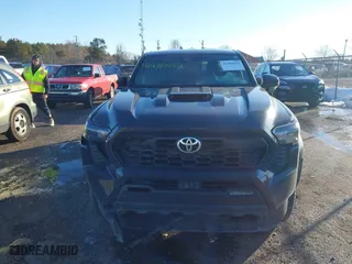 2024 Toyota Tacoma 4WD SR5 with VIN 3TMLB5JN9RM040490, listed as a IAAI auction lot 41480152 with 10,490 mi miles. Bid and sale history available at carsss.com. Image 12.