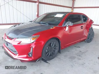 2016 Scion tC z VIN JTKJF5C77GJ023409, wystawiony jako IAAI lot #41538972 z przebiegiem 121 283 mil mil oraz . Historia ofert i sprzedaży dostępna na DreamBid. Obrazek 17.