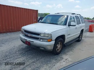 2001 Chevrolet Tahoe LT z VIN 1GNEC13TX1R202308, wystawiony jako IAAI lot #42285307 z przebiegiem 279 908 mil mil oraz . Historia ofert i sprzedaży dostępna na DreamBid. Obrazek 2.