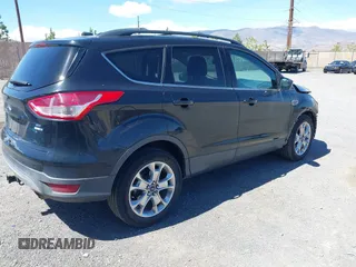 2014 Ford Escape SE z VIN 1FMCU9G97EUB64559, wystawiony jako IAAI lot #42238726 z przebiegiem 124 633 mil mil oraz . Historia ofert i sprzedaży dostępna na DreamBid. Obrazek 4.