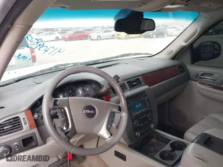 2009 GMC Yukon SLT w/4SB with VIN 1GKFC33009R149228, listed as a IAAI auction lot 41709590 with 212,227 mi miles. Bid and sale history available at carsss.com. Image 18.