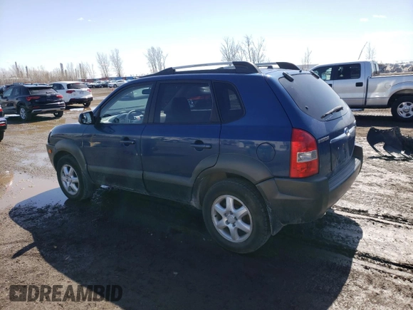 2005 Hyundai Tucson GL with VIN KM8JM72D55U167063, listed as a Copart auction lot 52002865 with 157,945 mi miles and Salvage Title. Bid and sale history available at carsss.com. Image 2.