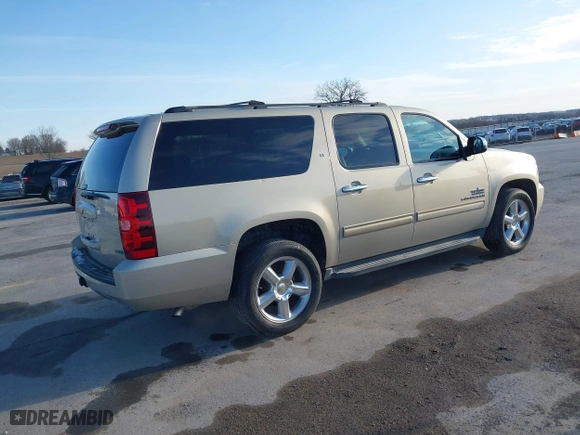 2012 Chevrolet Suburban LT with VIN 1GNSCJE07CR144215, listed as a IAAI auction lot 41924631 with 144,072 mi miles. Bid and sale history available at carsss.com. Image 4.