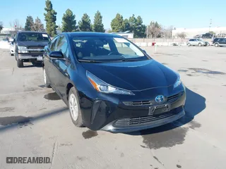 2021 Toyota Prius L Eco with VIN JTDKAMFU0M3133871, listed as a IAAI auction lot 41364847 with 66,102 mi miles. Bid and sale history available at carsss.com. Image 1.