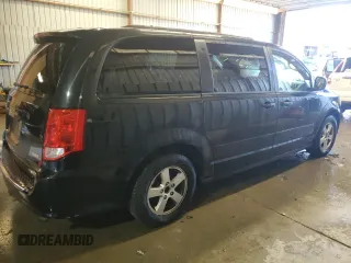 2012 Dodge Grand Caravan SXT with VIN 2C4RDGCG0CR340868, listed as a Copart auction lot 85560274 with 242,089 mi miles and Clean Title. Bid and sale history available at DreamBid. Image 3.