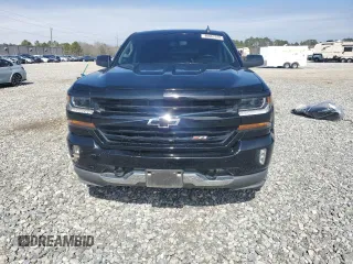 2018 Chevrolet Silverado 1500 LT with VIN 3GCUKREC3JG425552, listed as a Copart auction lot 46662535 with 122,469 mi miles and Salvage Title. Bid and sale history available at carsss.com. Image 5.