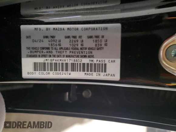 2024 Mazda 3 S Select Sport with VIN JM1BPAKMXR1718852, listed as a Copart auction lot 61240255 with 6,748 mi miles and Salvage title. Bid and sale history available at DreamBid. Image 12.