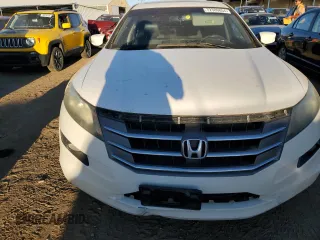 2010 Honda Crosstour EX-L z VIN 5J6TF2H53AL010216, wystawiony jako Copart lot #72386854 z przebiegiem 140 995 mil mil oraz Czysty tytuł • Clean title. Historia ofert i sprzedaży dostępna na DreamBid. Obrazek 5.