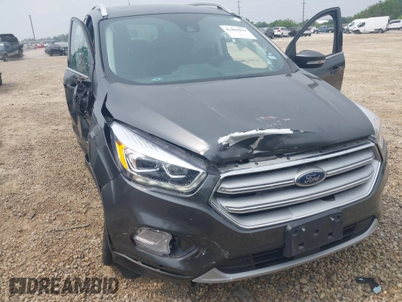 2019 Ford Escape Titanium with VIN 1FMCU0J97KUA34281, listed as a IAAI auction lot 42409579 with 55,400 mi miles and . Bid and sale history available at DreamBid. Image 12.