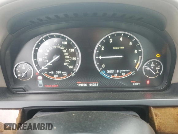 2013 BMW 7 Series 740i with VIN WBAYA6C53DD143952, listed as a Copart auction lot 76064454 with 119,896 mi miles and Clean Title. Bid and sale history available at carsss.com. Image 9.