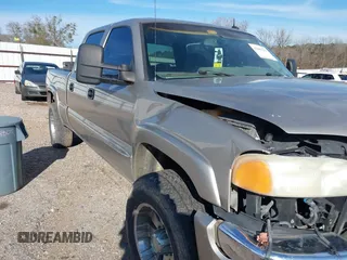 2003 GMC Sierra 1500HD SLE z VIN 1GTGK13U43F230834, wystawiony jako IAAI lot #41281221 z przebiegiem 213 362 mil mil oraz . Historia ofert i sprzedaży dostępna na DreamBid. Obrazek 22.