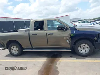 2014 Ram 1500 Tradesman with VIN 1C6RR6FG6ES233212, listed as a IAAI auction lot 41940763 with 131,914 mi miles and . Bid and sale history available at DreamBid. Image 13.