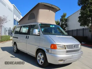 2003 Volkswagen EuroVan MV with VIN WV2NB47003H003033, listed as a Copart auction lot 47059195 with 164,173 mi miles and Clean Title. Bid and sale history available at DreamBid. Image 1.