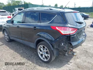 2013 Ford Escape Titanium z VIN 1FMCU9J93DUC06684, wystawiony jako IAAI lot #42606418 z przebiegiem 109 270 mil mil oraz . Historia ofert i sprzedaży dostępna na DreamBid. Obrazek 3.