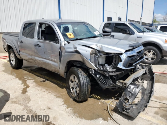 2015 Toyota Tacoma with VIN 3TMLU4EN7FM181570, listed as a Copart auction lot 53056985 with Not Provided miles and Salvage Title. Bid and sale history available at DreamBid. Image 4.