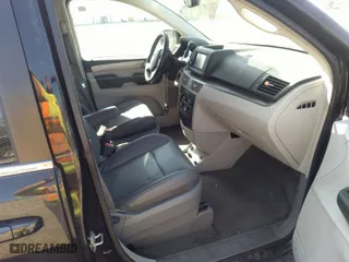 2014 Volkswagen Routan SE w/RSE & Navigation with VIN 2C4RVABG3ER134698, listed as a IAAI auction lot 41796736 with 110,282 mi miles. Bid and sale history available at carsss.com. Image 5.