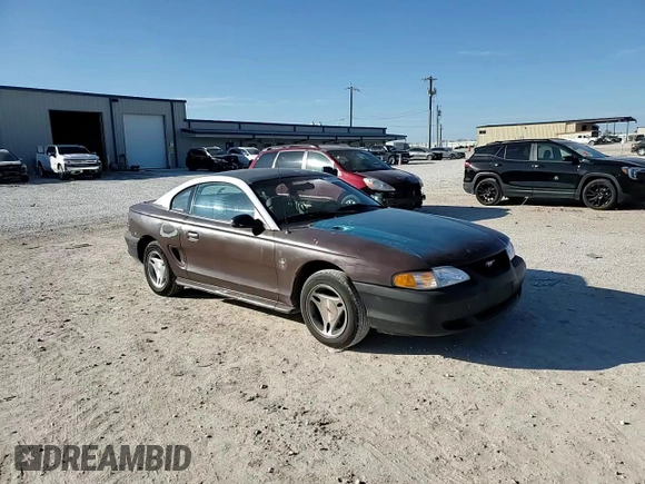 1997 Ford Mustang with VIN 1FALP4043VF174092, listed as a Copart auction lot 86983884 with 105,774 mi miles and Salvage Title. Bid and sale history available at carsss.com. Image 11.