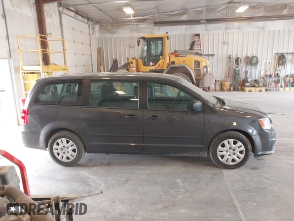 2016 Dodge Grand Caravan SE with VIN 2C4RDGBG1GR117200, listed as a IAAI auction lot 42104773 with 121,007 mi miles and . Bid and sale history available at DreamBid. Image 13.