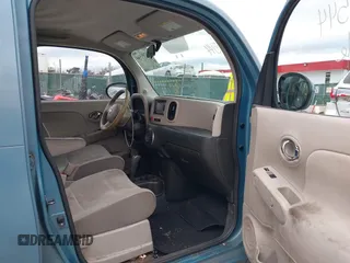 2010 Nissan Cube S z VIN JN8AZ2KRXAT170470, wystawiony jako IAAI lot #41751544 z przebiegiem 108 437 mil mil oraz . Historia ofert i sprzedaży dostępna na DreamBid. Obrazek 5.