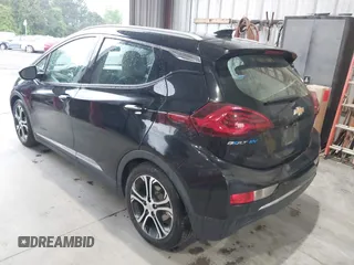 2019 Chevrolet Bolt EV Premier with VIN 1G1FZ6S09K4106306, listed as a IAAI auction lot 41947642 with 90,952 mi miles and . Bid and sale history available at DreamBid. Image 3.