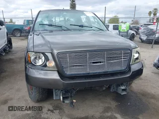 2005 Ford F-150 XLT with VIN 1FTPW12575KB99409, listed as a IAAI auction lot 41711304 with 1 mi miles. Bid and sale history available at carsss.com. Image 6.