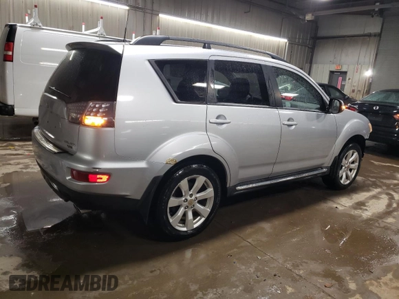 2010 Mitsubishi Outlander XLS z VIN JA4JT4AX9AZ002688, wystawiony jako Copart lot #51173605 z przebiegiem 162 147 mil mil oraz Szkoda całkowita • Salvage title. Historia ofert i sprzedaży dostępna na DreamBid. Obrazek 3.