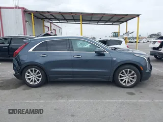 2019 Cadillac XT4 AWD Luxury with VIN 1GYFZBR41KF160352, listed as a IAAI auction lot 42047477 with 58,850 mi miles and . Bid and sale history available at DreamBid. Image 13.