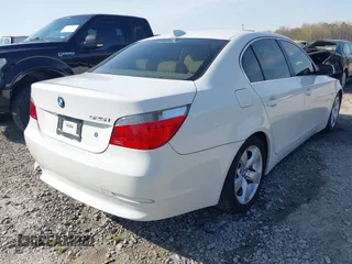 2007 BMW 5 Series 525i with VIN WBANE53527CW62776, listed as a IAAI auction lot 41870614 with 180,886 mi miles and . Bid and sale history available at carsss.com. Image 4.