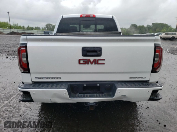 2017 GMC Sierra 1500 Denali z VIN 3GTU2PEJ8HG353759, wystawiony jako Copart lot #56432225 z przebiegiem 107 371 mil mil oraz Czysty tytuł • Clean title. Historia ofert i sprzedaży dostępna na DreamBid. Obrazek 6.