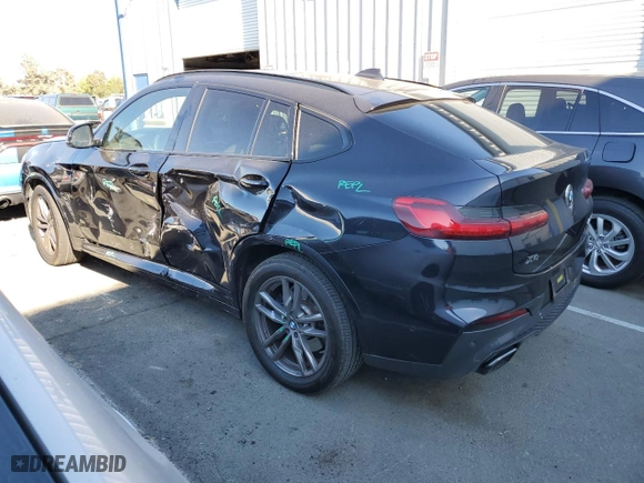 2020 BMW X4 M40i with VIN 5UX2V5C04L9D60103, listed as a Copart auction lot 72379394 with NaN miles and Salvage Title. Bid and sale history available at carsss.com. Image 2.