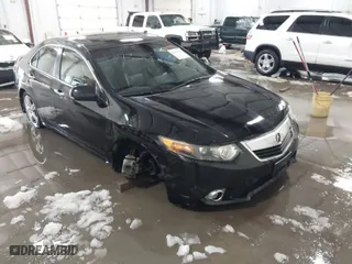 2013 Acura TSX with VIN JH4CU2F46DC004001, listed as a IAAI auction lot 41282127 with 135,990 mi miles. Bid and sale history available at carsss.com. Image 1.
