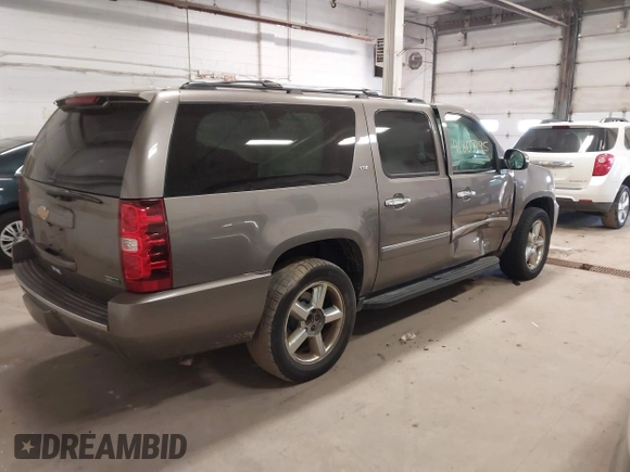 2012 Chevrolet Suburban LTZ with VIN 1GNSKKE79CR180400, listed as a IAAI auction lot 41807195 with 154,410 mi miles and . Bid and sale history available at carsss.com. Image 4.