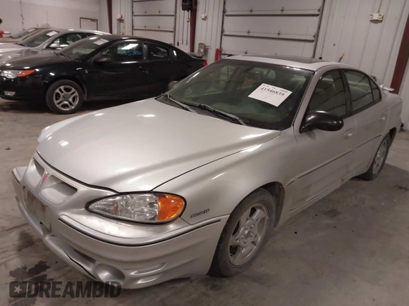 2003 Pontiac Grand Am GT with VIN 1G2NW52E93M605453, listed as a IAAI auction lot 41546839 with 202,918 mi miles. Bid and sale history available at carsss.com. Image 2.