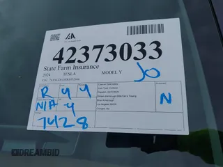 2024 Tesla Model Y z VIN 7SAYGDEDXRF032666, wystawiony jako IAAI lot #42373033 z przebiegiem 7 428 mil mil oraz . Historia ofert i sprzedaży dostępna na DreamBid. Obrazek 20.