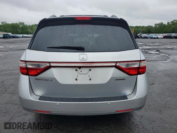 2011 Honda Odyssey Touring with VIN 5FNRL5H99BB021223, listed as a Copart auction lot 61171775 with 194,029 mi miles and Salvage title. Bid and sale history available at DreamBid. Image 6.
