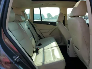 2013 Volkswagen Tiguan SE z VIN WVGAV7AX2DW023093, wystawiony jako Copart lot #64694405 z przebiegiem 137 460 mil mil oraz Szkoda całkowita • Salvage title. Historia ofert i sprzedaży dostępna na DreamBid. Obrazek 11.