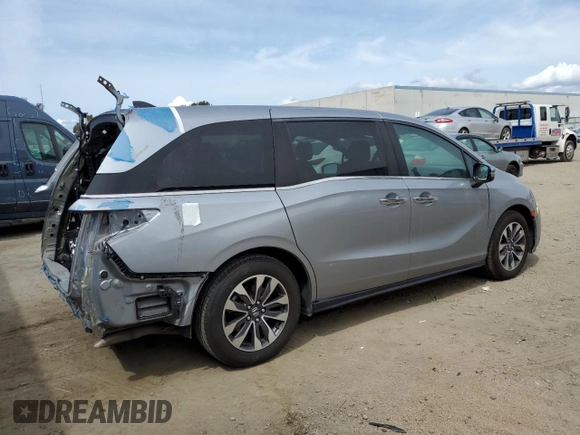 2021 Honda Odyssey EX-L with VIN 5FNRL6H74MB010119, listed as a Copart auction lot 52353355 with 39,366 mi miles and Salvage Title. Bid and sale history available at DreamBid. Image 3.